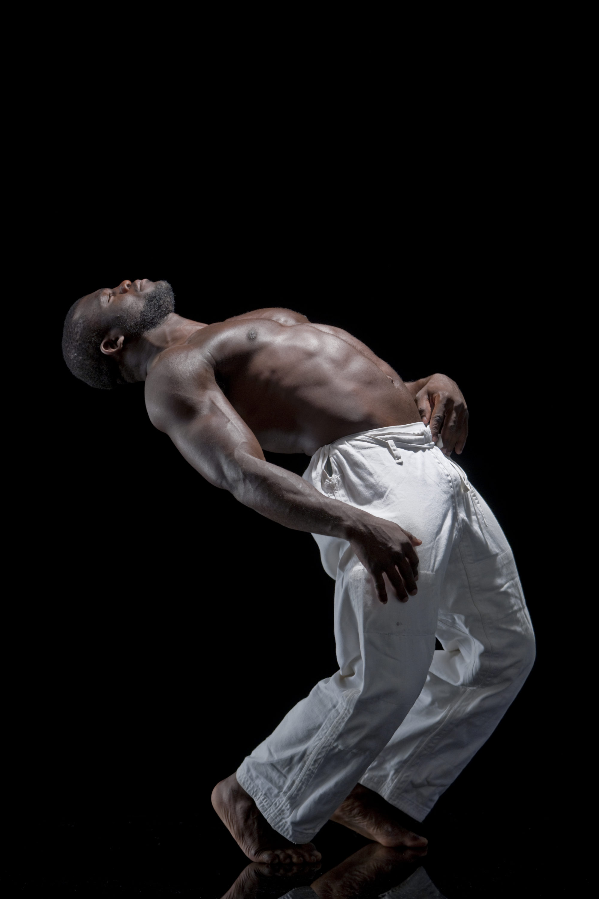 Foto di Ritratto di un judoka su fondo nero